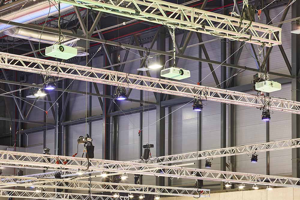 Lighting and projectors truss structure indoor set. Exhibition hall. Show